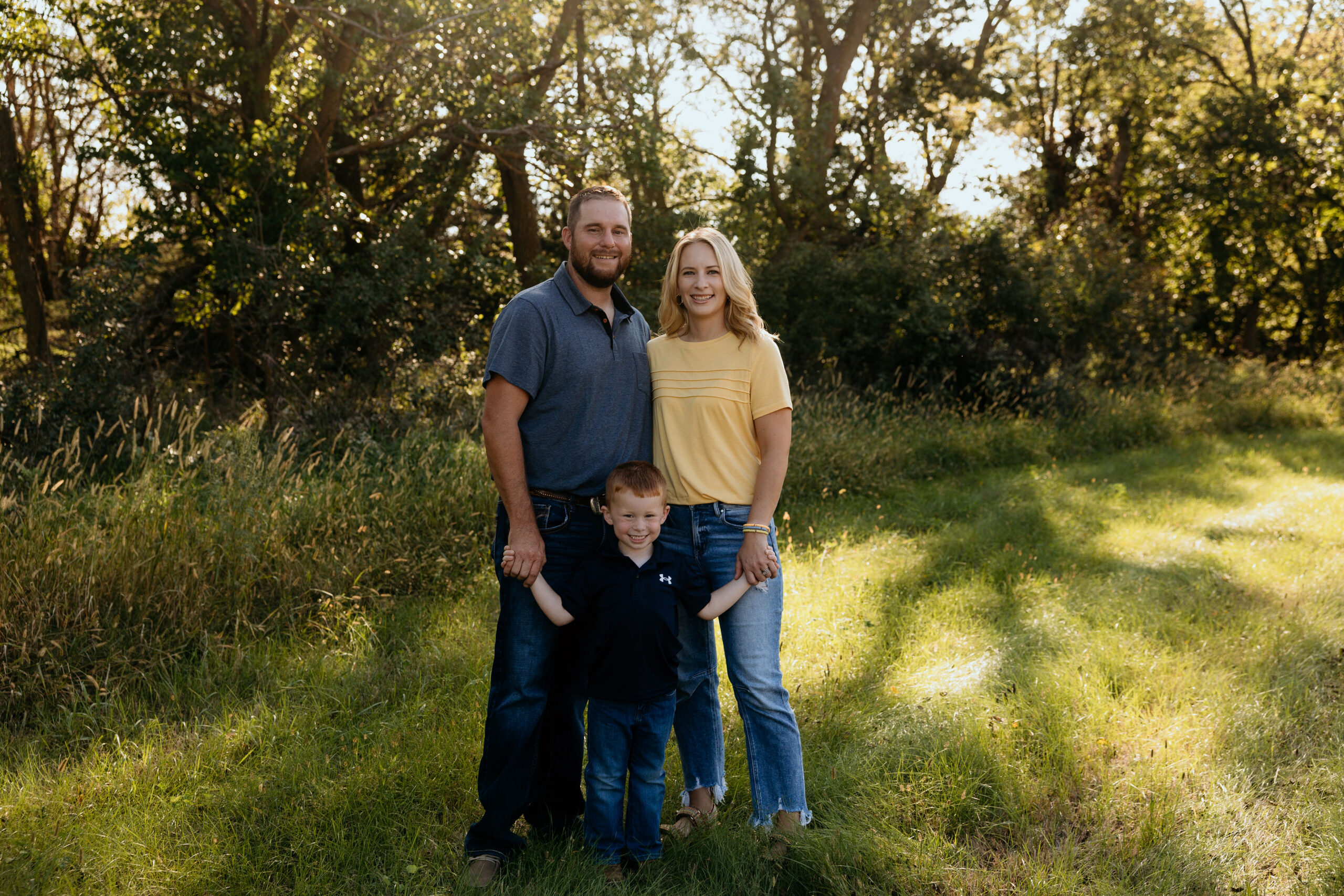 Mariha Schroeder with her husband and son outdoors